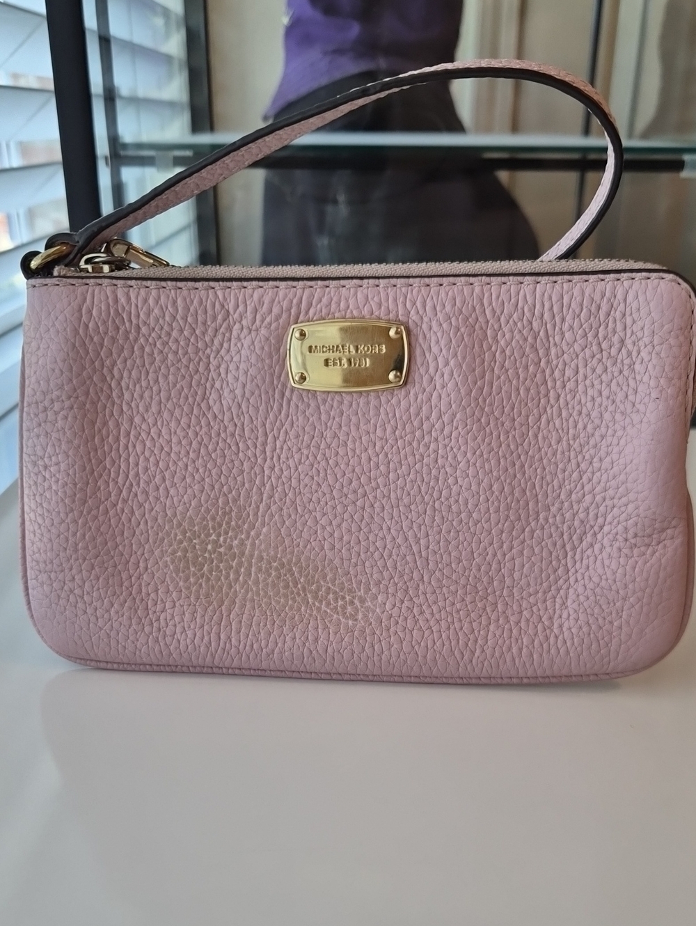 Michael Kors Light Pink Pebbled Leather Wristlet with Gold Plaque